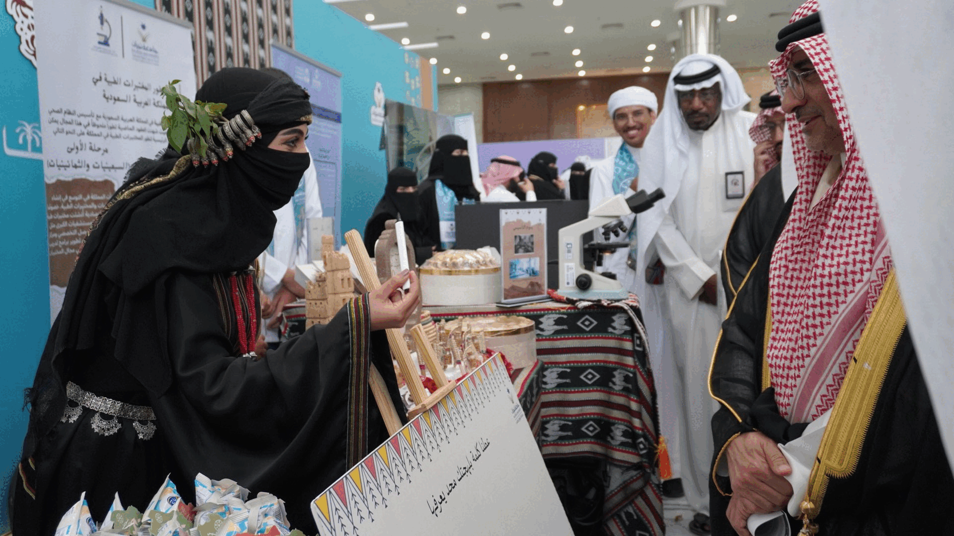 The President of the University visited the college's booth at the 